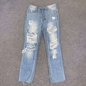Light wash straight leg ripped jeans